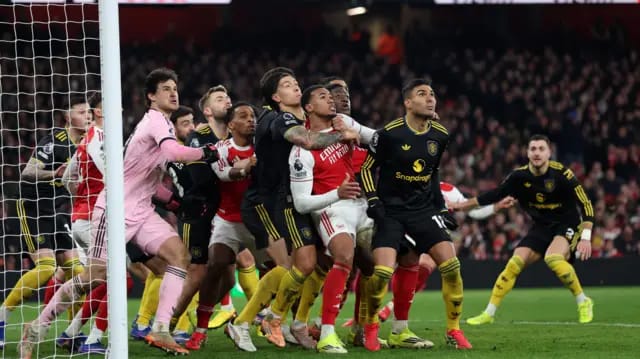 Michael Carrick praises Manchester United as Senne Lammens reacts after Arsenal win